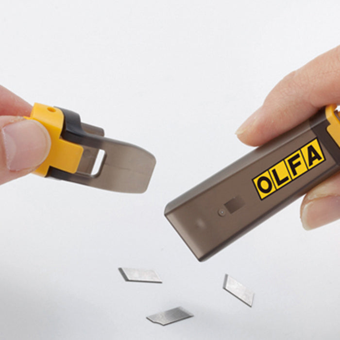 Cutter Estándar con contenedor de cuchillas 9mm - "OLFA DA-1"